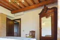 Łóżko lub łóżka w pokoju w obiekcie Agriturismo Podere Il Sorbo