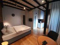 A bed or beds in a room at Taxim No18 Boutique Hotel