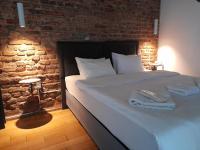 A bed or beds in a room at Taxim No18 Boutique Hotel