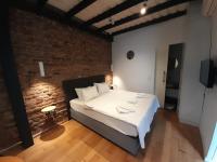 A bed or beds in a room at Taxim No18 Boutique Hotel