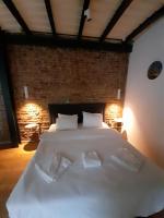 A bed or beds in a room at Taxim No18 Boutique Hotel