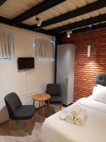 A bed or beds in a room at Taxim No18 Boutique Hotel