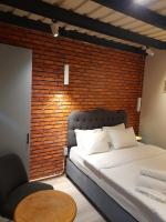 A bed or beds in a room at Taxim No18 Boutique Hotel