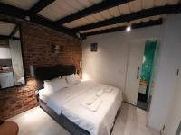A bed or beds in a room at Taxim No18 Boutique Hotel