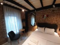 A bed or beds in a room at Taxim No18 Boutique Hotel