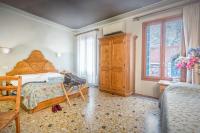 Posteľ alebo postele v izbe v ubytovaní Alloggi B&b Allegri
