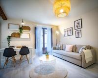 Posedenie v ubytovaní Apartamentos UXAMA LUXURY EPONA - junto a la Plaza Mayor con ascensor