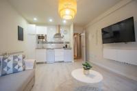 Kuchyňa alebo kuchynka v ubytovaní Apartamentos UXAMA LUXURY EPONA - junto a la Plaza Mayor con ascensor