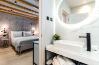 Postel nebo postele na pokoji v ubytování Amoretta rooms