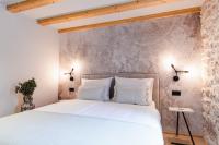 Postel nebo postele na pokoji v ubytování Amoretta rooms