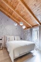 Postel nebo postele na pokoji v ubytování Amoretta rooms