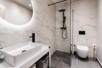 Koupelna v ubytování Amoretta rooms