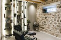 Posezení v ubytování Amoretta rooms