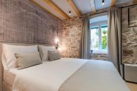 Postel nebo postele na pokoji v ubytování Amoretta rooms