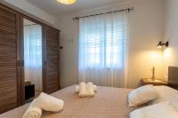 Posteľ alebo postele v izbe v ubytovaní HANA Luxury apartment with sea view