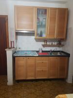 Kuchyňa alebo kuchynka v ubytovaní Nunzia's House
