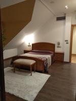 Postel nebo postele na pokoji v ubytování Hotel Rural Finca Aldeola