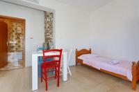 Posteľ alebo postele v izbe v ubytovaní Apartmani Stanka & Joso