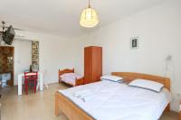 Posteľ alebo postele v izbe v ubytovaní Apartmani Stanka & Joso