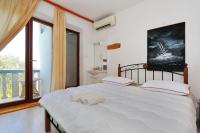 Posteľ alebo postele v izbe v ubytovaní Apartmani Stanka & Joso