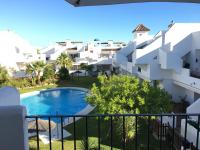 Bazén v ubytovaní Hacienda Golf Ático Islantilla alebo v jeho blízkosti