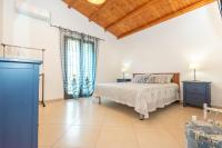 Posteľ alebo postele v izbe v ubytovaní Villa Deluxe