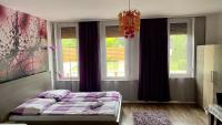Posteľ alebo postele v izbe v ubytovaní Gyula Vár Prémium Apartman