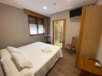Postel nebo postele na pokoji v ubytování Hotel Rural Finca Aldeola