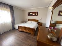 Postel nebo postele na pokoji v ubytování Hotel Rural Finca Aldeola