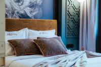 Posteľ alebo postele v izbe v ubytovaní Espero Royal Stay