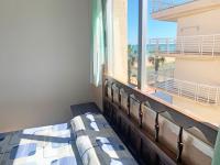 Postel nebo postele na pokoji v ubytování Apartamento Papa Luna Primera Línea 3000