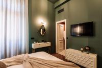 Posteľ alebo postele v izbe v ubytovaní Espero Royal Stay