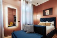 Posteľ alebo postele v izbe v ubytovaní Espero Royal Stay