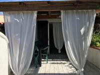 Balkón alebo terasa v ubytovaní Villaggio Tamerici IUN Q7142
