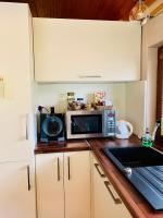 A kitchen or kitchenette at Grand Spa Holiday Home
