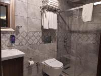Koupelna v ubytování Magnaura House Hotel