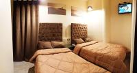 Postel nebo postele na pokoji v ubytování grand agata hostel