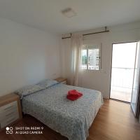 Postel nebo postele na pokoji v ubytování Martina Maria Beach