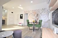 Posezení v ubytování Novalja Penthouse Apartment