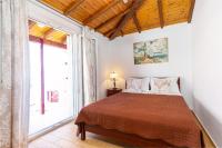 Posteľ alebo postele v izbe v ubytovaní Nicolas Beach House