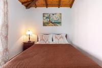 Posteľ alebo postele v izbe v ubytovaní Nicolas Beach House