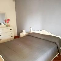 A bed or beds in a room at B&B La Scapola