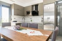 Kuchyňa alebo kuchynka v ubytovaní Kamilari Paradise Luxury Villa