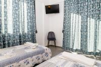 Posteľ alebo postele v izbe v ubytovaní Kamilari Paradise Luxury Villa