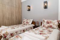 Posteľ alebo postele v izbe v ubytovaní Kamilari Paradise Luxury Villa