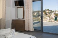 Posteľ alebo postele v izbe v ubytovaní Kamilari Paradise Luxury Villa