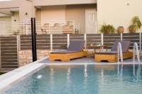 Bazén v ubytovaní Kamilari Paradise Luxury Villa alebo v jeho blízkosti