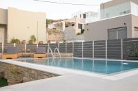 Bazén v ubytovaní Kamilari Paradise Luxury Villa alebo v jeho blízkosti