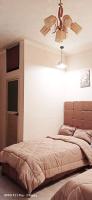 Postel nebo postele na pokoji v ubytování grand agata hostel