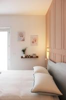 A bed or beds in a room at ReGenzio